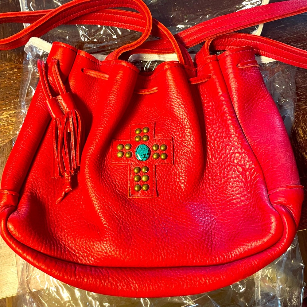 Eternal Perspective buffalo skin bag. Red, with turquoise stone.